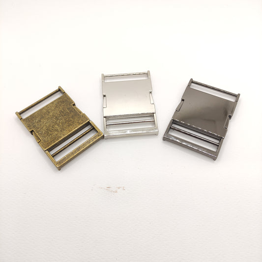 Side release buckle